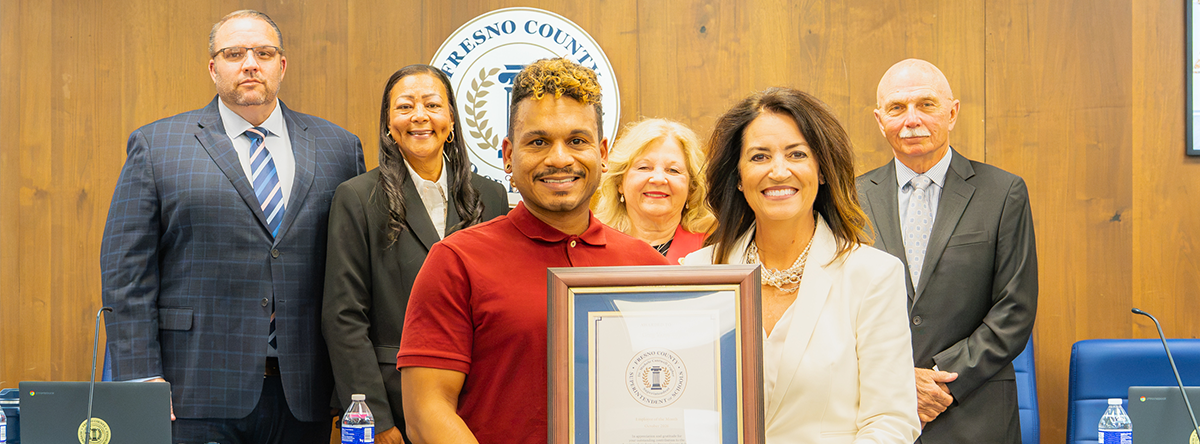 October Employee of the Month with Dr. Copher and Board of Education